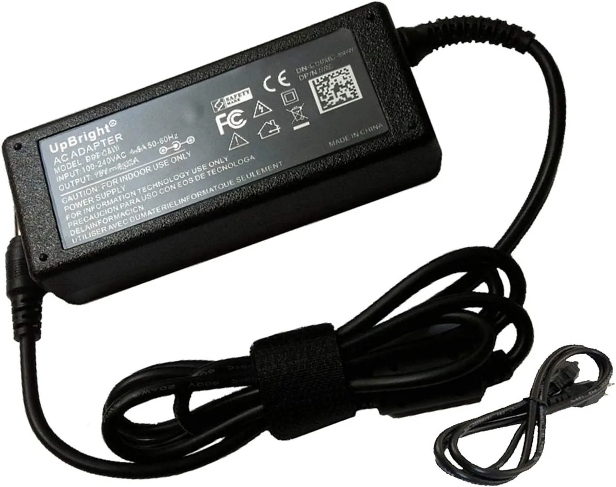 Black rectangular AC adapter with octagonal barrel connector and fixed mains cable