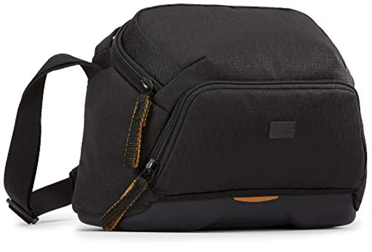 Black compact camera sling bag with articulating strap and water-resistant EVA base