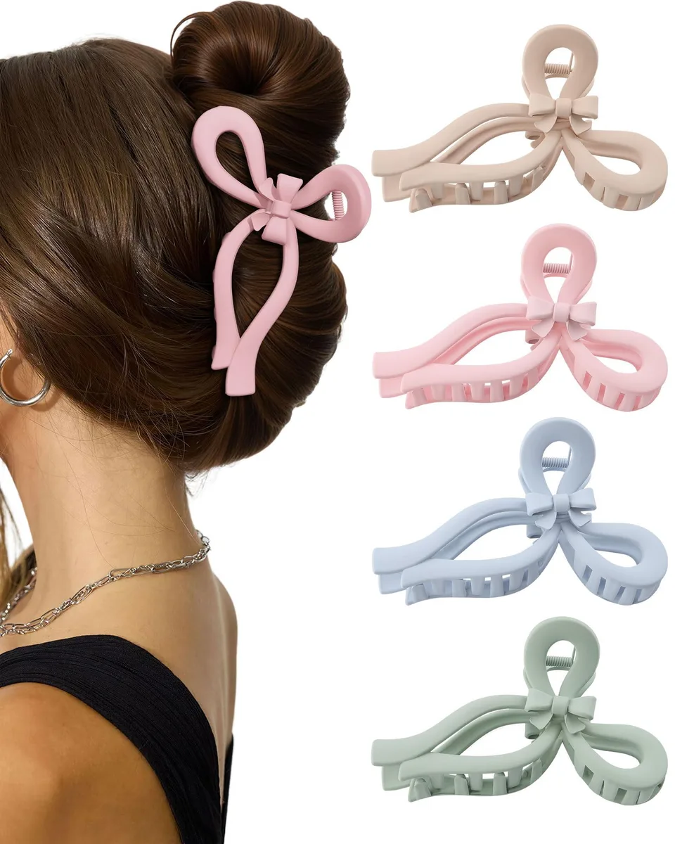Four large polycarbonate bow claw clips in assorted colours