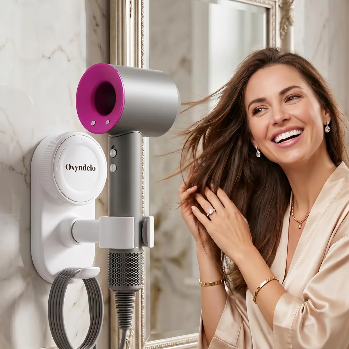White wall-mounted hair dryer holder with suction cup, ball joint and cord organiser
