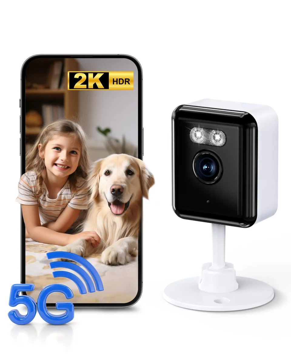 Small white wireless camera with solar panel on top