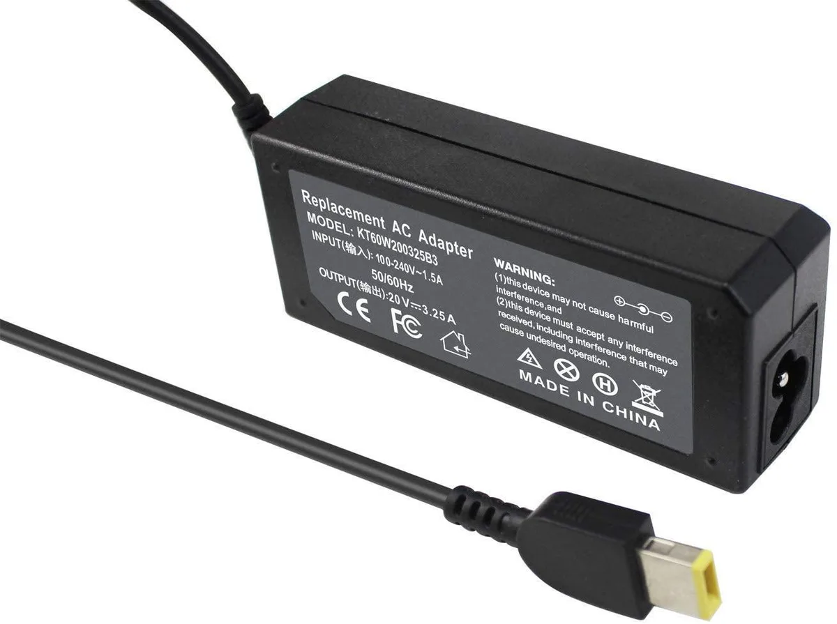 Compact black USB-C laptop charger with detachable mains cable