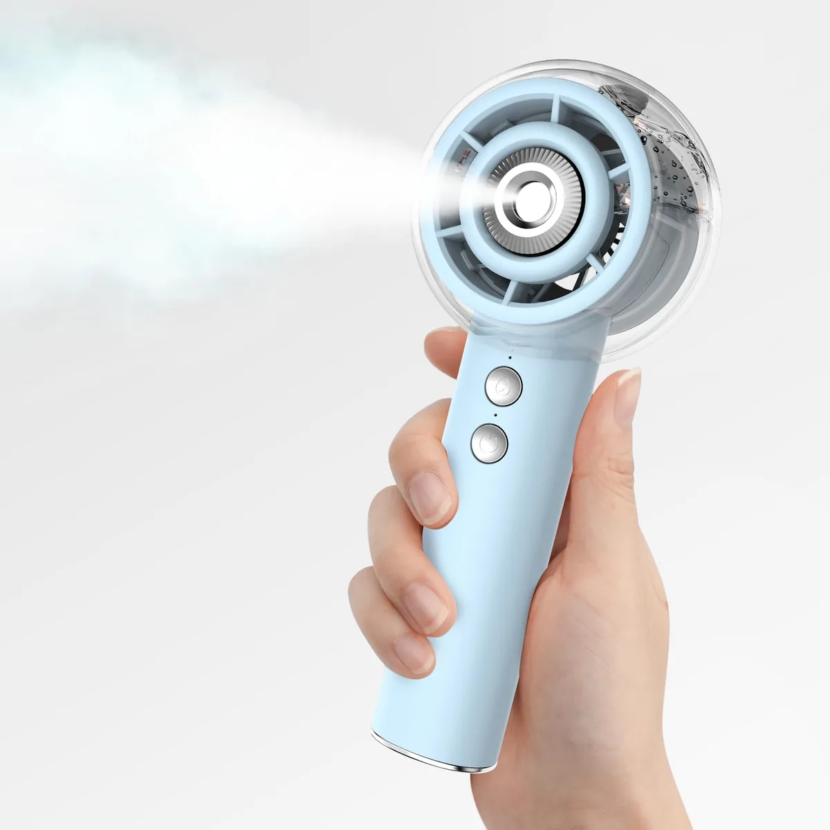Silver portable misting fan with visible water tank and turbine blades