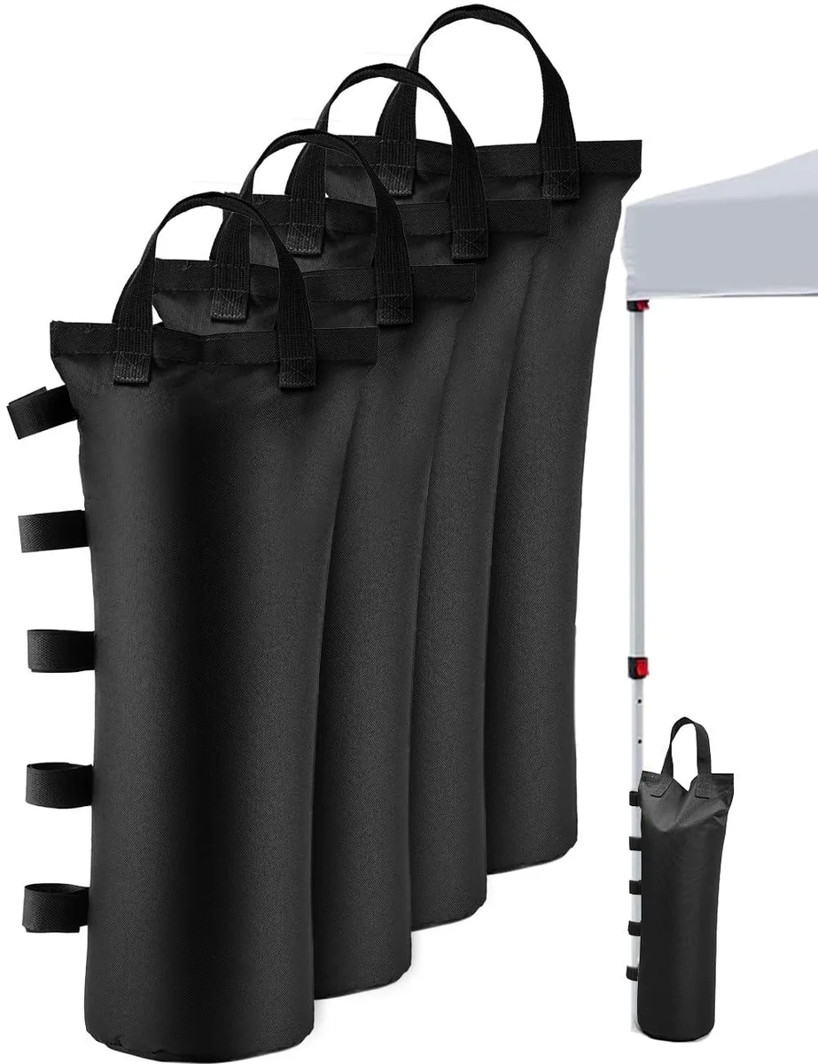 Four white rectangular canopy weight bags with nylon handles and hook-and-loop straps