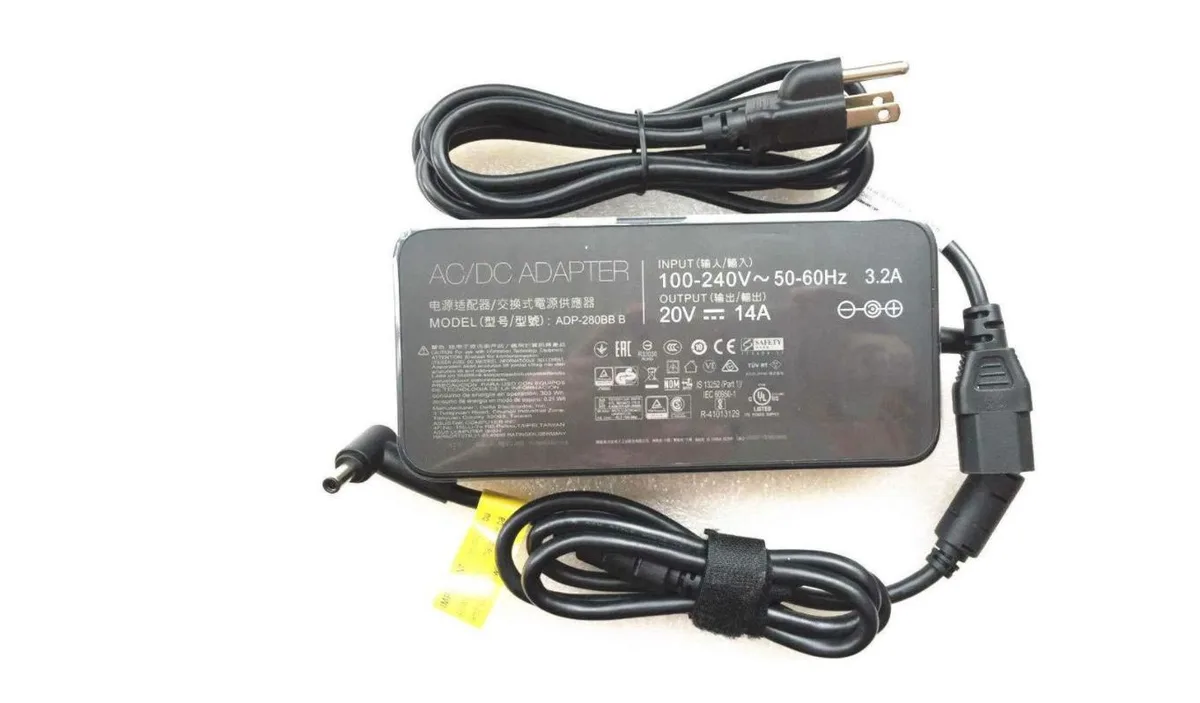 Black rectangular AC adapter brick with barrel connector cable