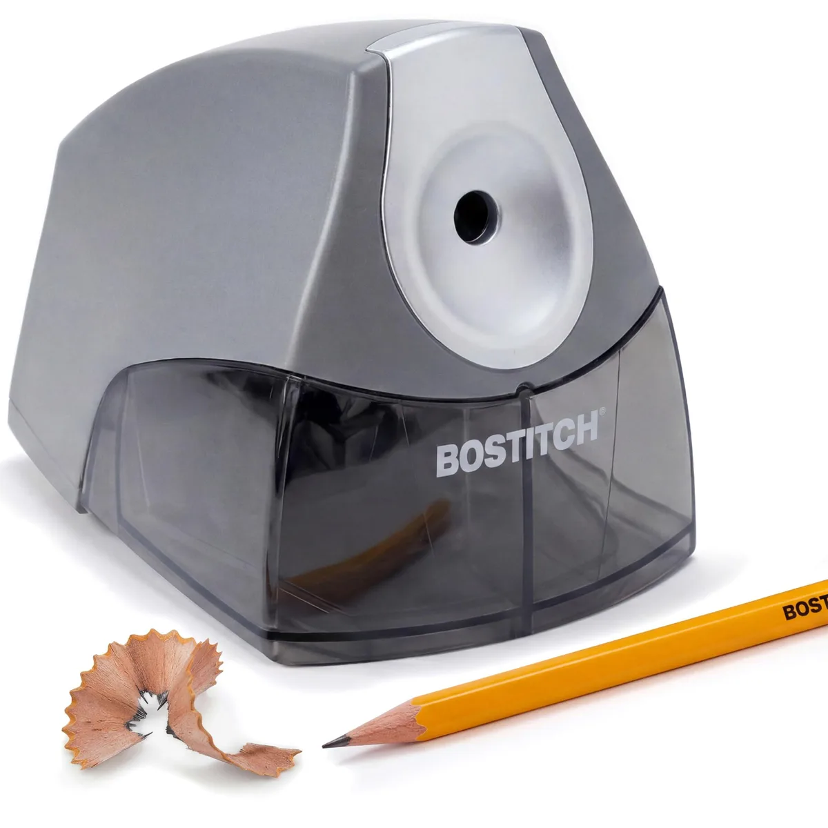 Compact gray plastic electric pencil sharpener, small rectangular shape with shavings tray