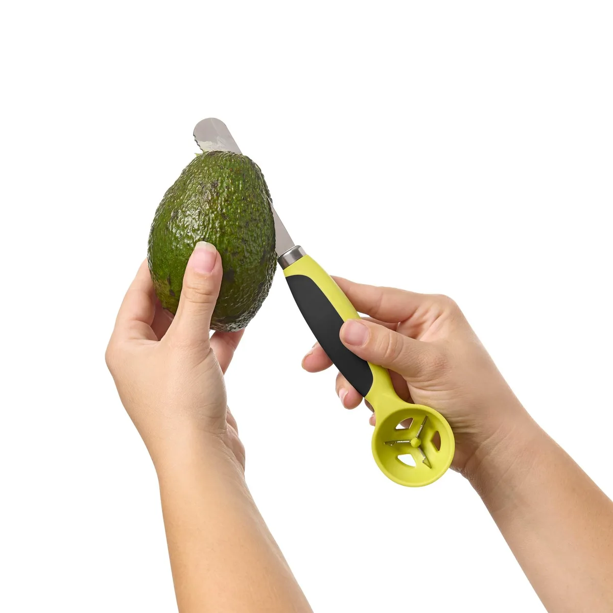 Green plastic-handled avocado tool with serrated stainless steel blade and toothed scoop, 9.25 in long