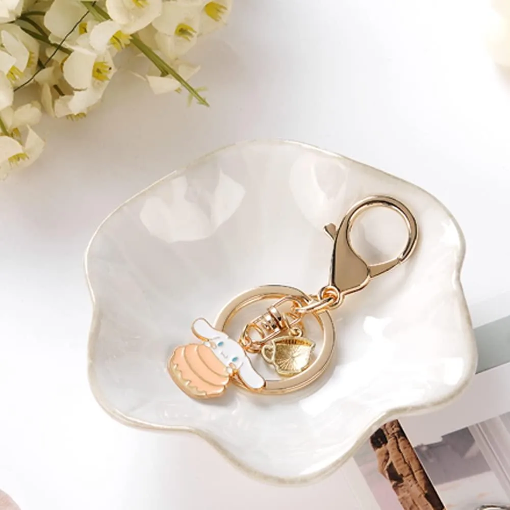 White ceramic lotus-leaf trinket tray with gold edge, 4.3 by 3.7 by 1 inches, 120 grams