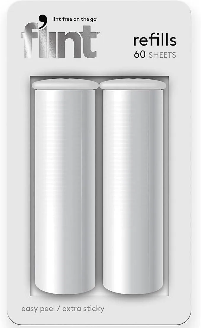 Two lint roller refill packs, compact white cylinders with tear-off sheets