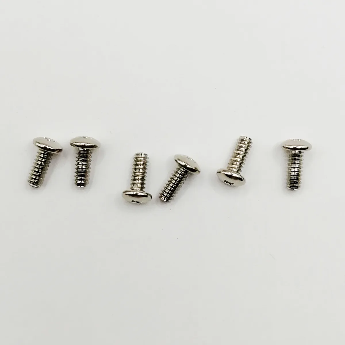 Six silver hinge screw assemblies for clipper trimmers