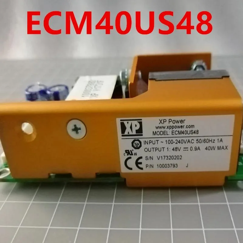 Silver rectangular ATX power supply unit with ventilation grille and label showing 48V .9A 40W 80 PLUS Gold