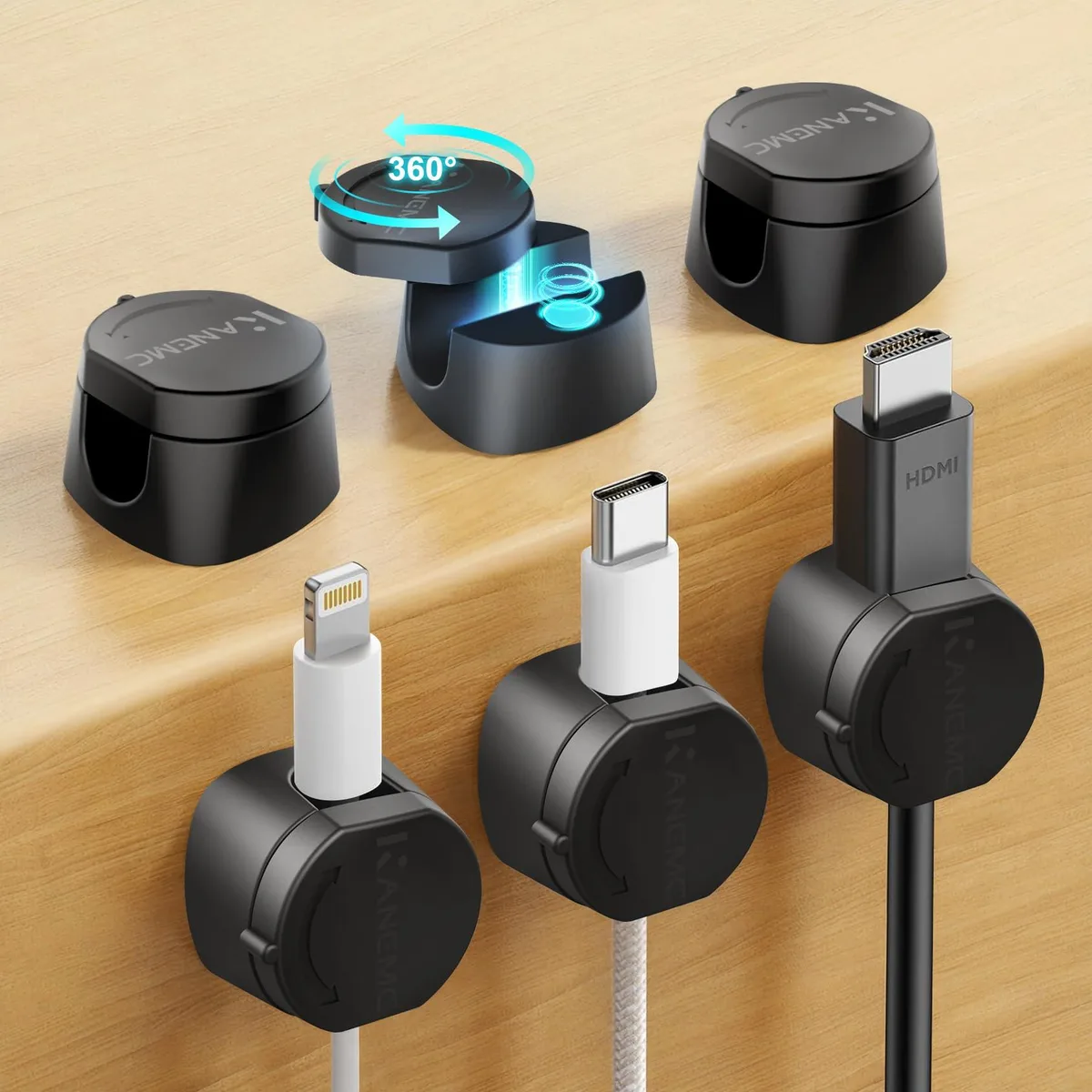 Six black plastic magnetic cord clips with self-adhesive bases