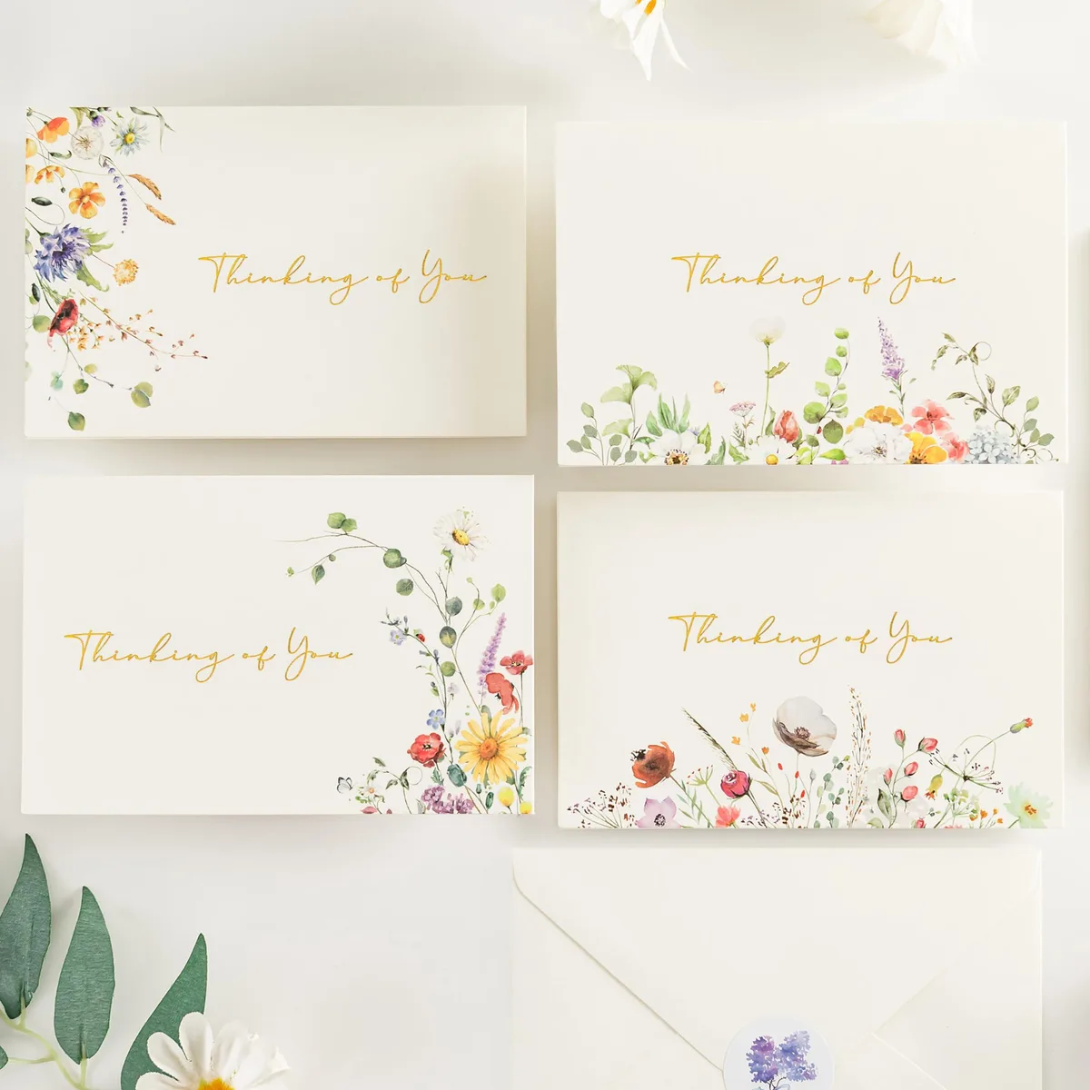 Boxed set of 12 floral greeting cards with gold foil accents and matching envelopes