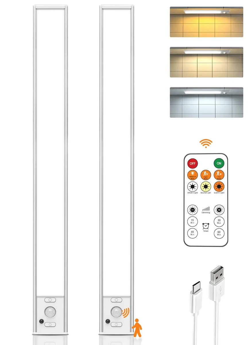 Two slim white LED bars with magnetic backs, USB cables and a small remote control