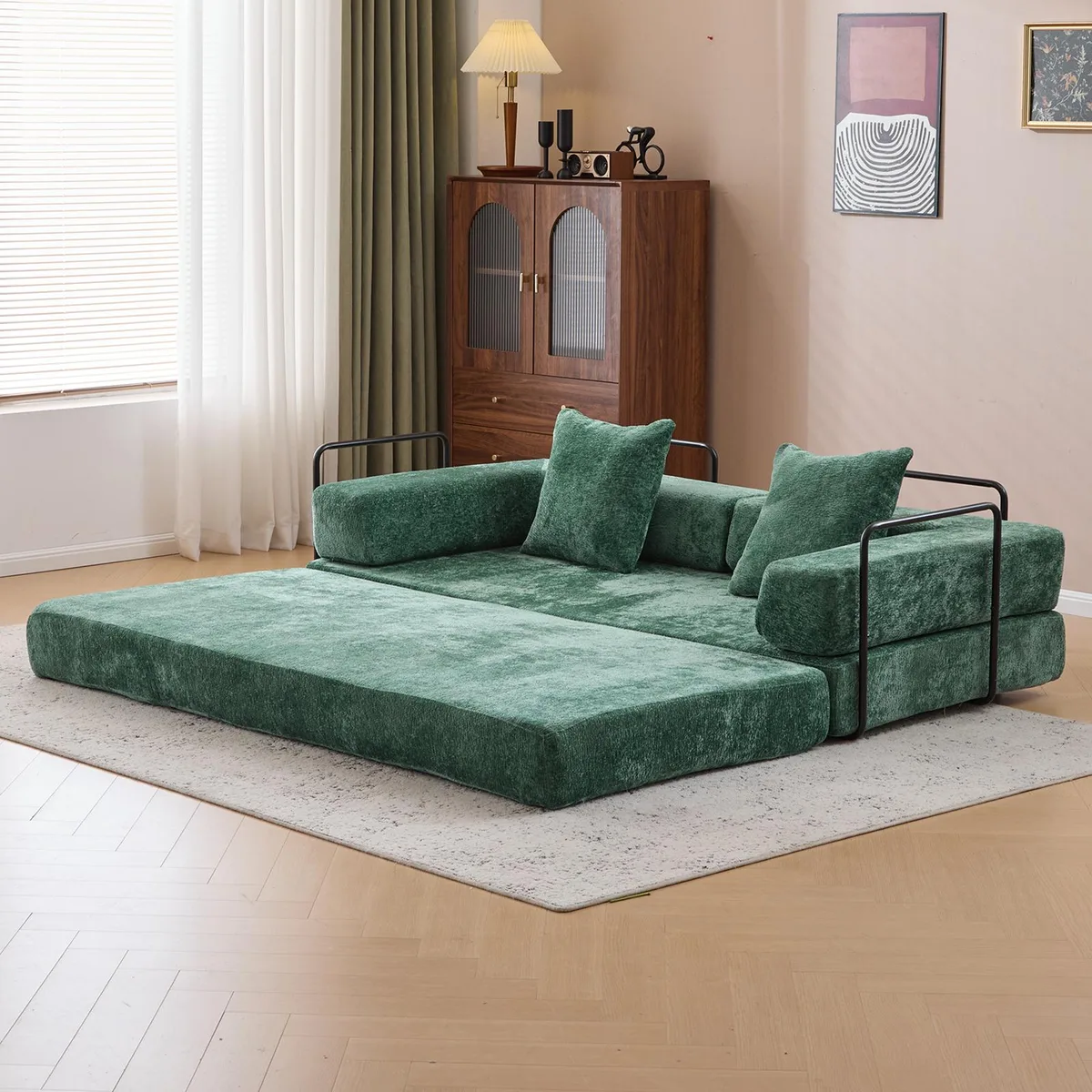 Dark green chenille floor sofa with folded armrests and back pillow