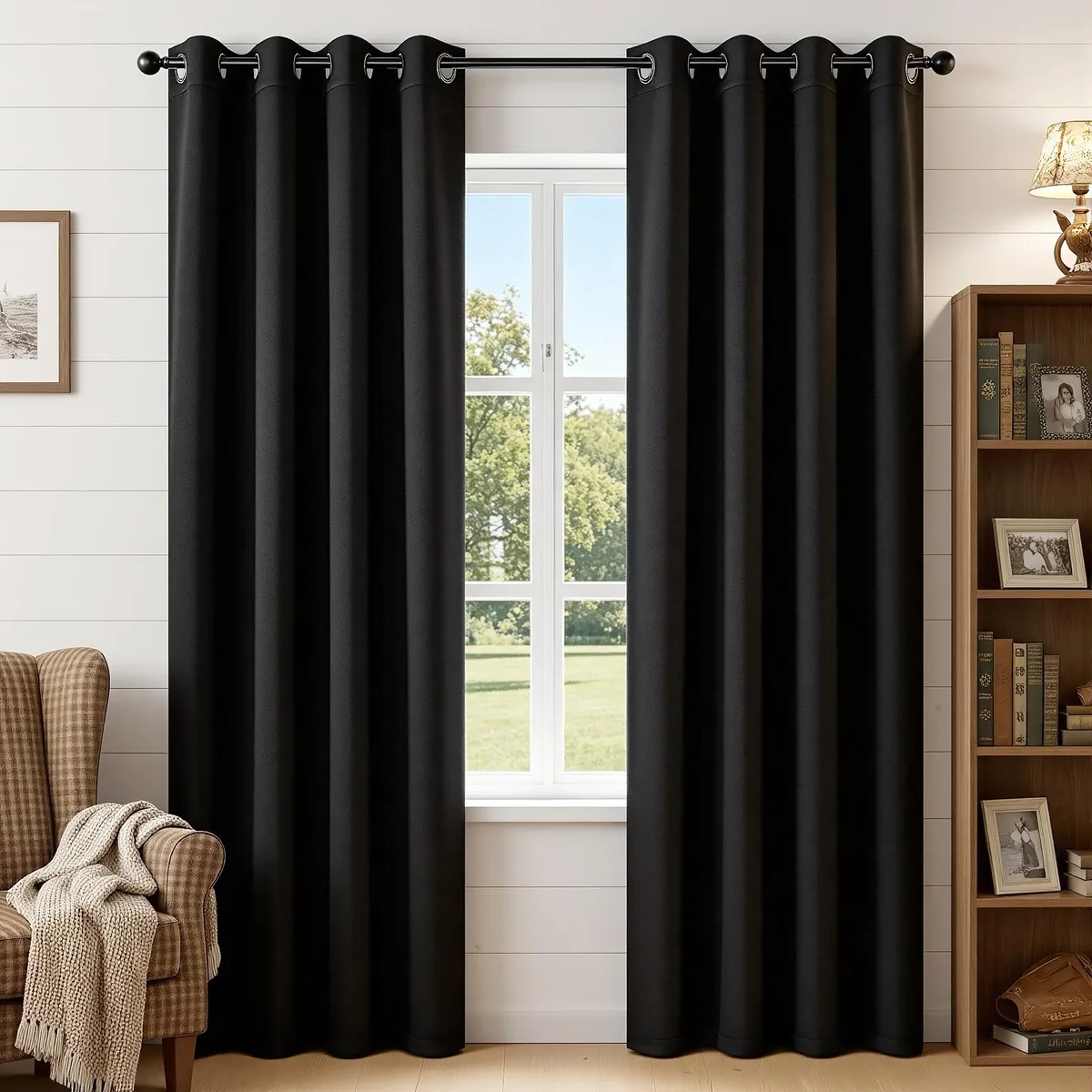 Two black polyester curtain panels with silver grommets, 52 inches wide by 84 inches long