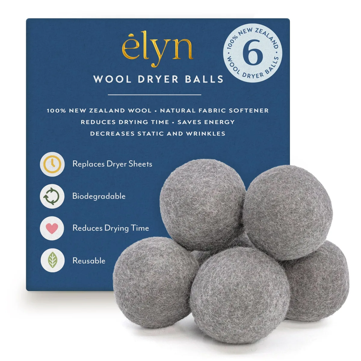 Six grey felted wool spheres in a rectangular box