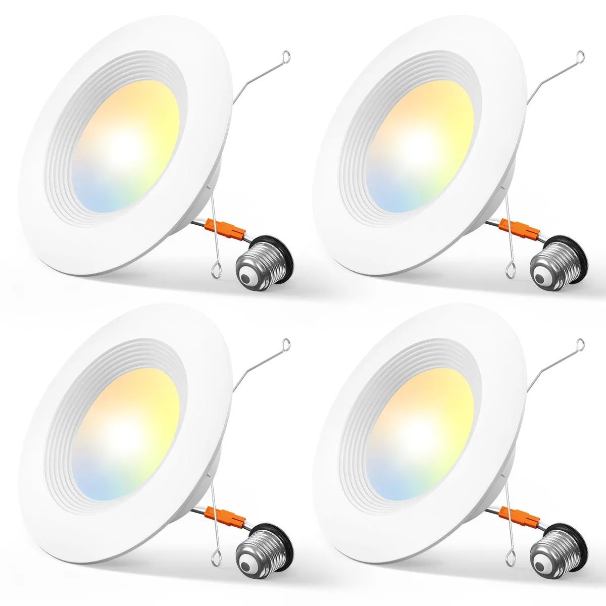 Four white recessed LED downlights with baffle trim shown in retail packaging