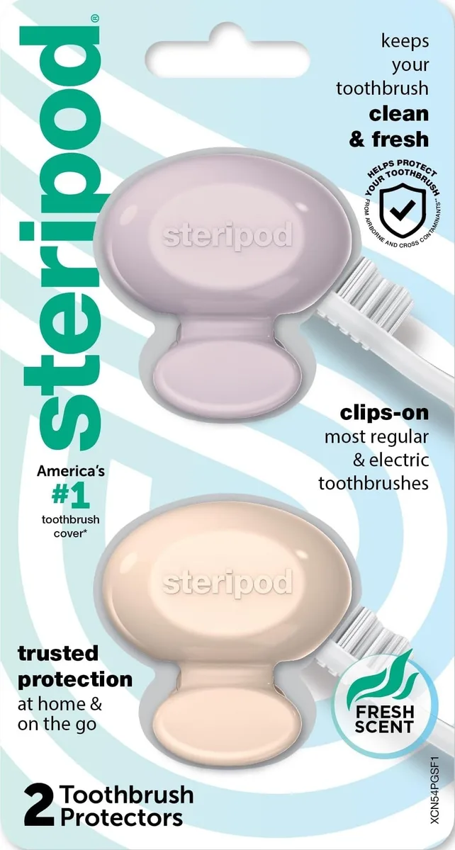 Two pink and blue clip-on toothbrush protectors side by side