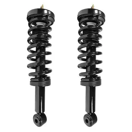 Pair of silver metal strut assemblies with coiled springs and top mounts ready for 4WD Ford F-150