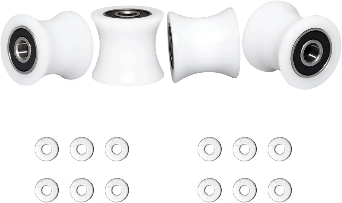 Four white rollers with bearings for Total Trainer glide boards