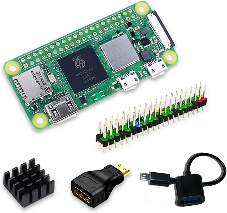 Green Raspberry Pi Zero 2 W board with silver aluminum heatsink, mini HDMI adapter, micro USB OTG adapter and 40-pin header