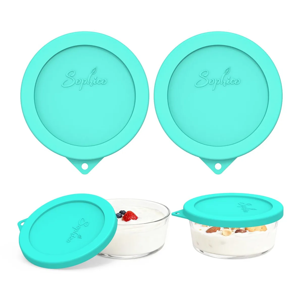 Two mint-green silicone lids, flexible round discs with smooth matte finish