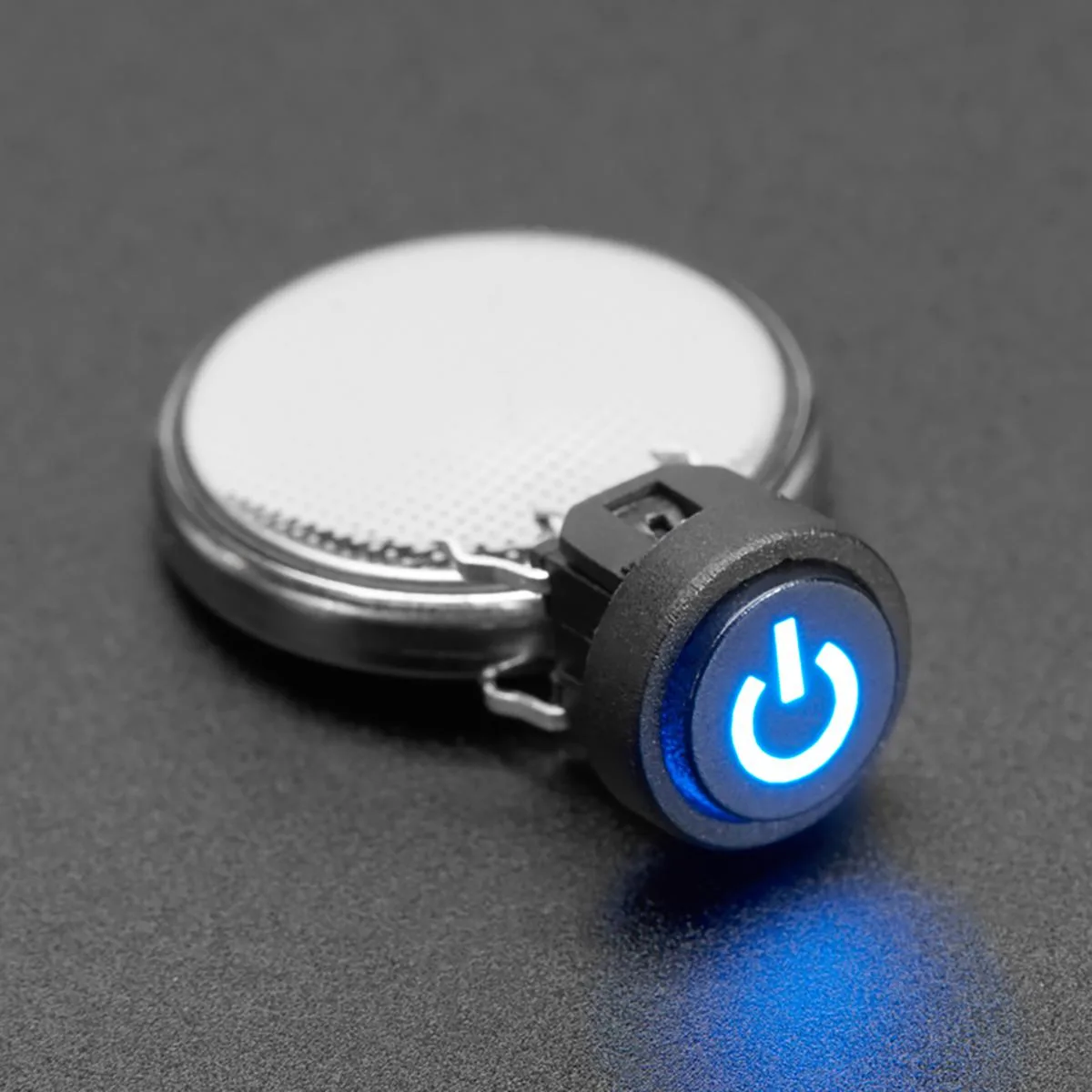 Adafruit Adafruit Mini Illuminated Momentary Pushbutton Blue Power Symbol — product photo