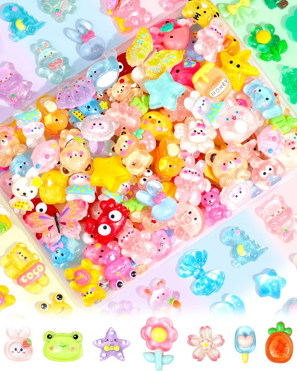 A bulk set of 100 small multicoloured flatback resin charms in assorted kawaii shapes