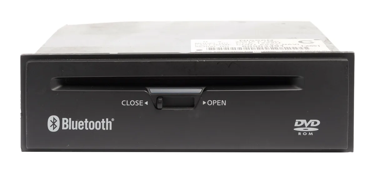 Glove-box mounted navigation unit with DVD slot and climate controls