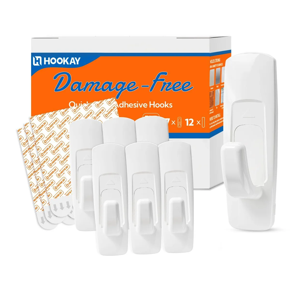 Seven white plastic adhesive hooks with twelve clear strips