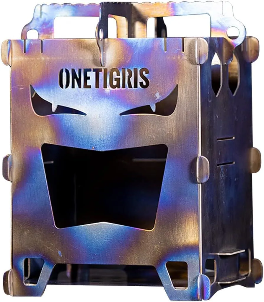 Foldable titanium stove, eight laser-cut panels, silver-grey finish, compact cube shape