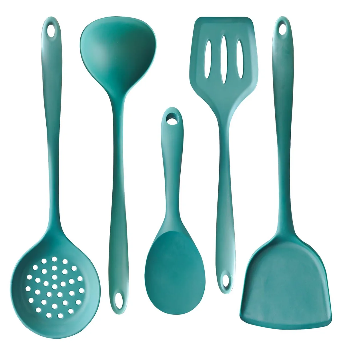 Five dark green silicone cooking utensils on a counter