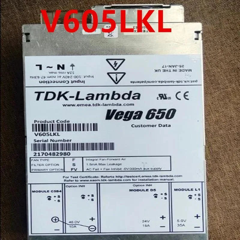 Rectangular ATX power supply unit, matte black metal casing with cooling fan grille and cable connectors visible