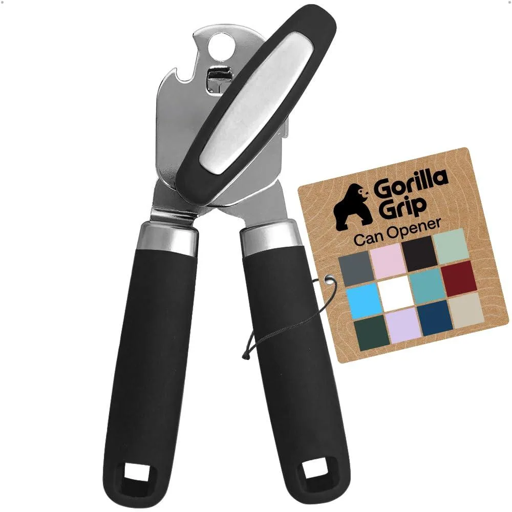 Black manual can opener with oversized turn knob and soft-grip handles