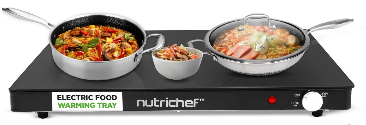 Black rectangular glass warming tray with cool-touch handles and rotary control dial