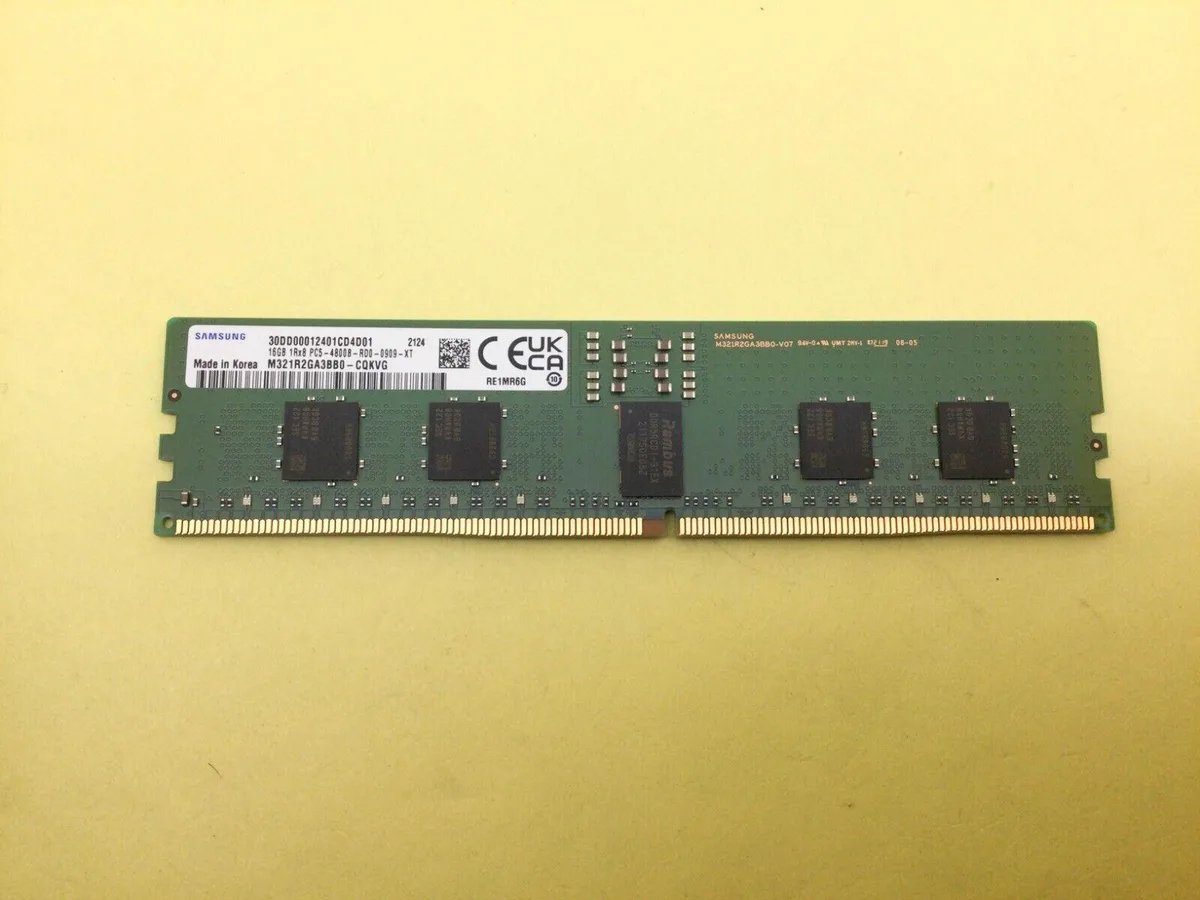 Green rectangular DDR5 memory module with gold edge contacts and black chips