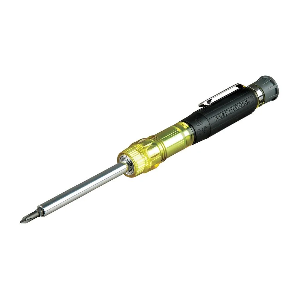 Compact pocket screwdriver with rotating cap, cushion grip, and four interchangeable bits