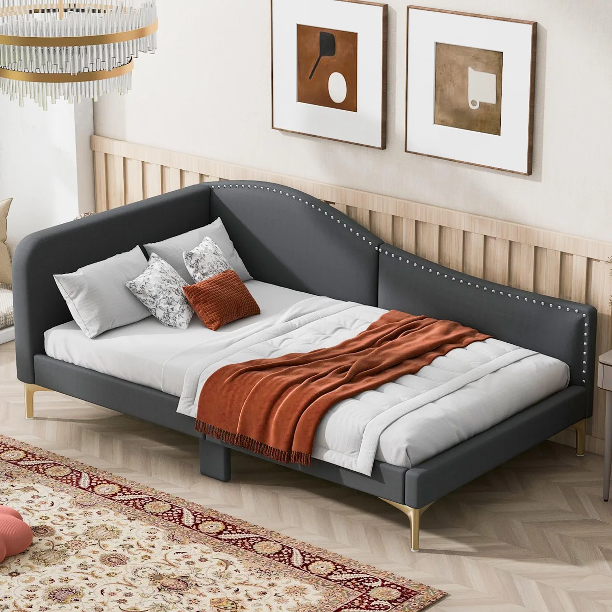 Twin upholstered daybed in grey fabric with headboard, armrest and support legs