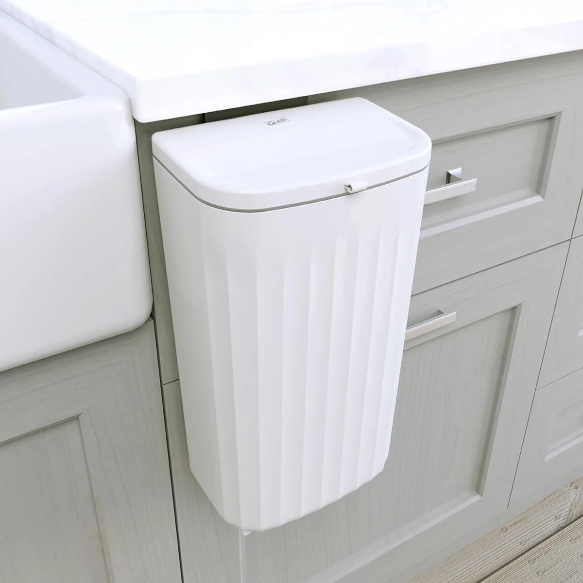 Three white rectangular plastic bins with dual-opening lids, each 12 litre capacity