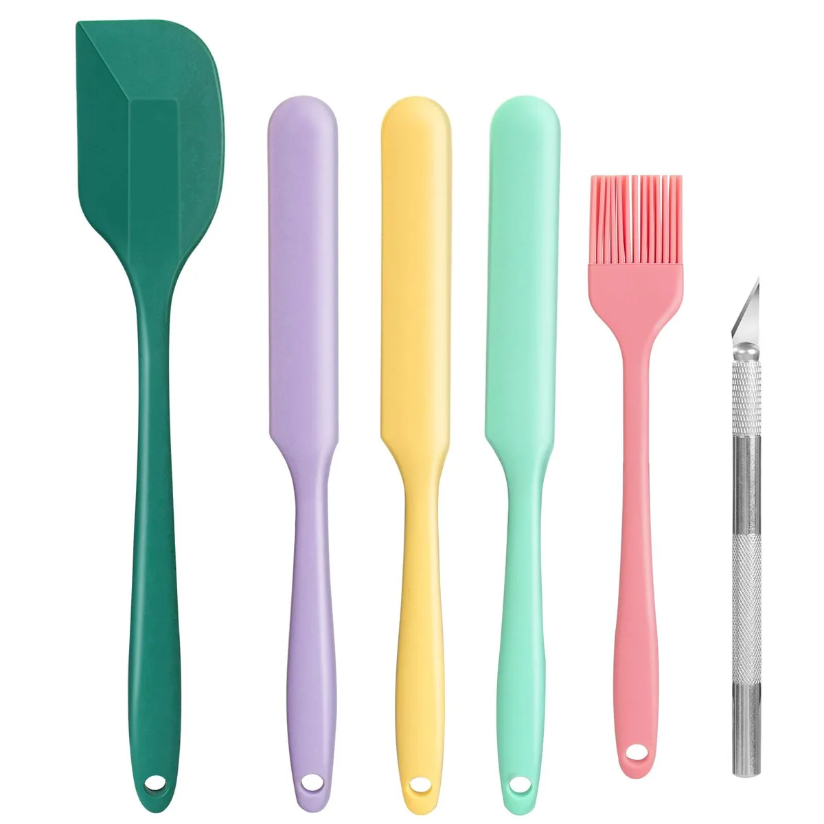 Six Pinon Green silicone spurtles in varying sizes lying flat