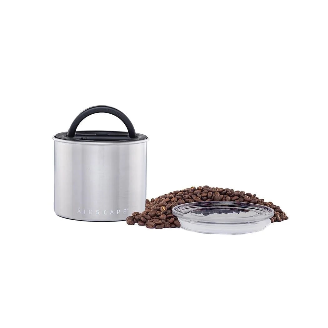 Small brushed-steel cylinder with patented plunger lid, 250 g capacity