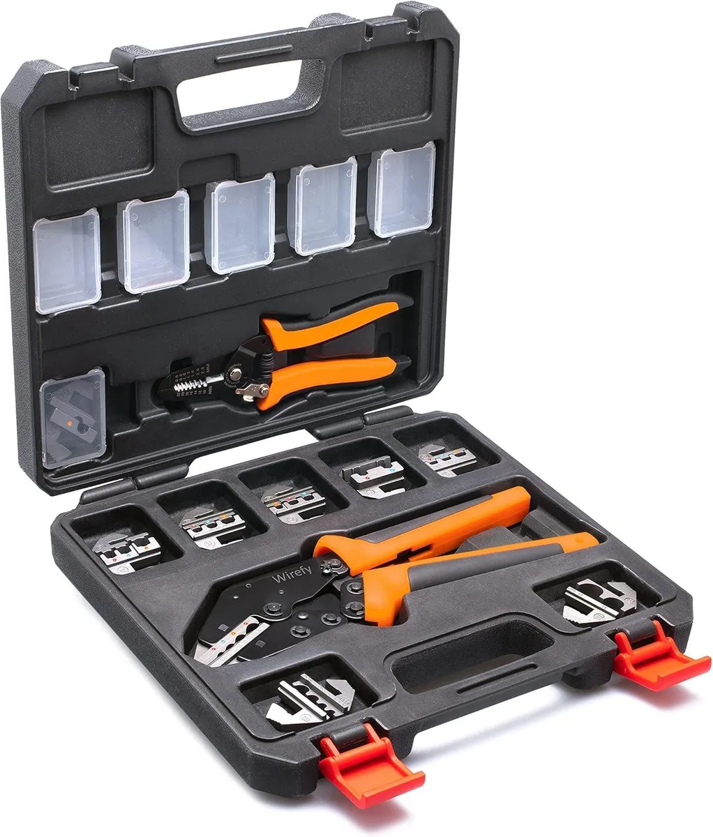 Nine-inch ratcheting crimper with ten interchangeable dies and a wire stripper in a briefcase