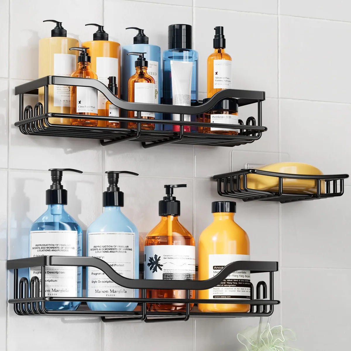 Three black rectangular shower shelves with chrome finish and adhesive mounting, plus a matching soap holder and hooks