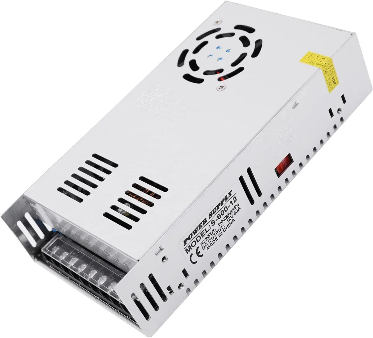 Metal-cased switching power supply with ventilation holes, input voltage selector switch, output terminals visible