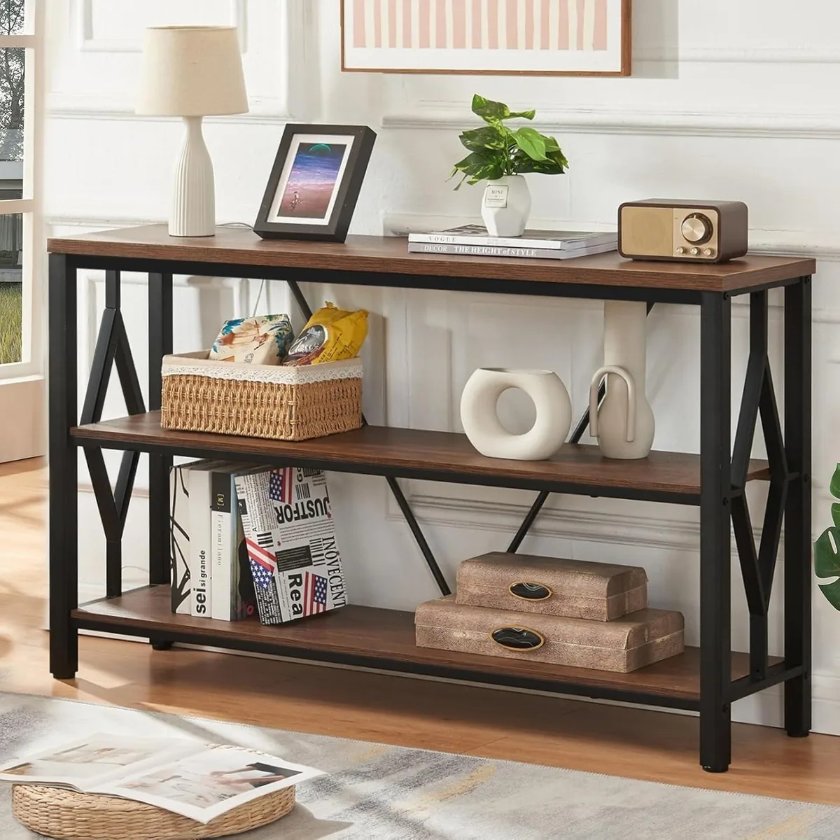 Rustic brown console table with three open shelves and diamond-shaped metal sides
