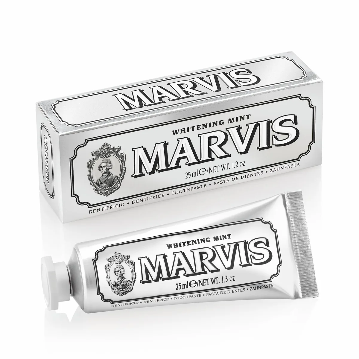 Small white toothpaste tube standing upright, minimalist silver cap, Marvis branding, 1.3 oz travel size