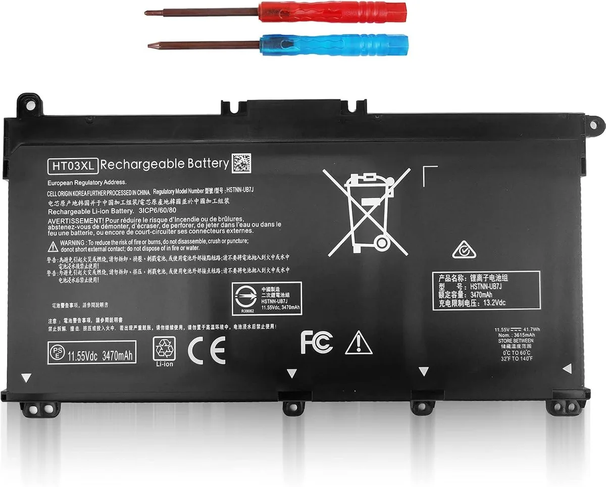 Black rectangular lithium-ion laptop battery with two small screwdrivers