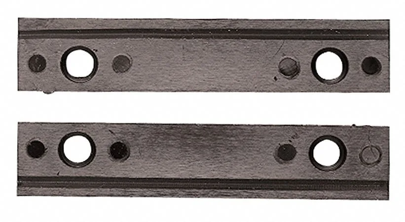 Pair of black nylon grooved jaws with two screws