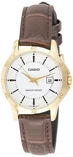 White analogue watch with gold accents on leather strap